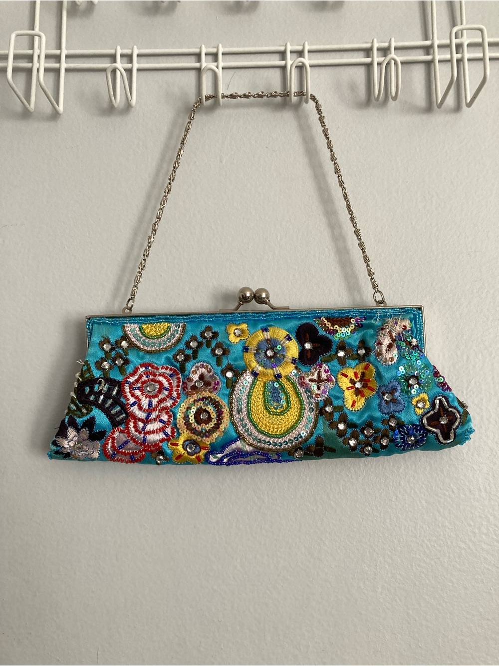 Small embellished clutch bag w/ beading and sequins. Aqua color. Used.